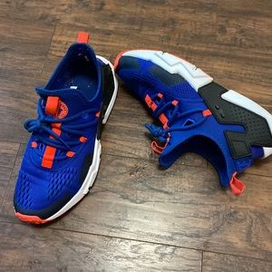Blue, white and orange Nike Huarache shoes size 11